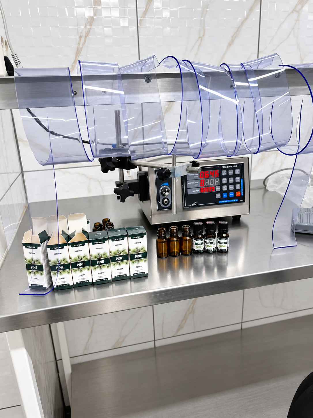 Filling a liquid product into bottles on the production line